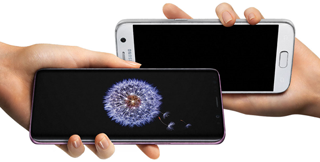 Two hands, each holding a Samsung Galaxy S9|S9+ phone
